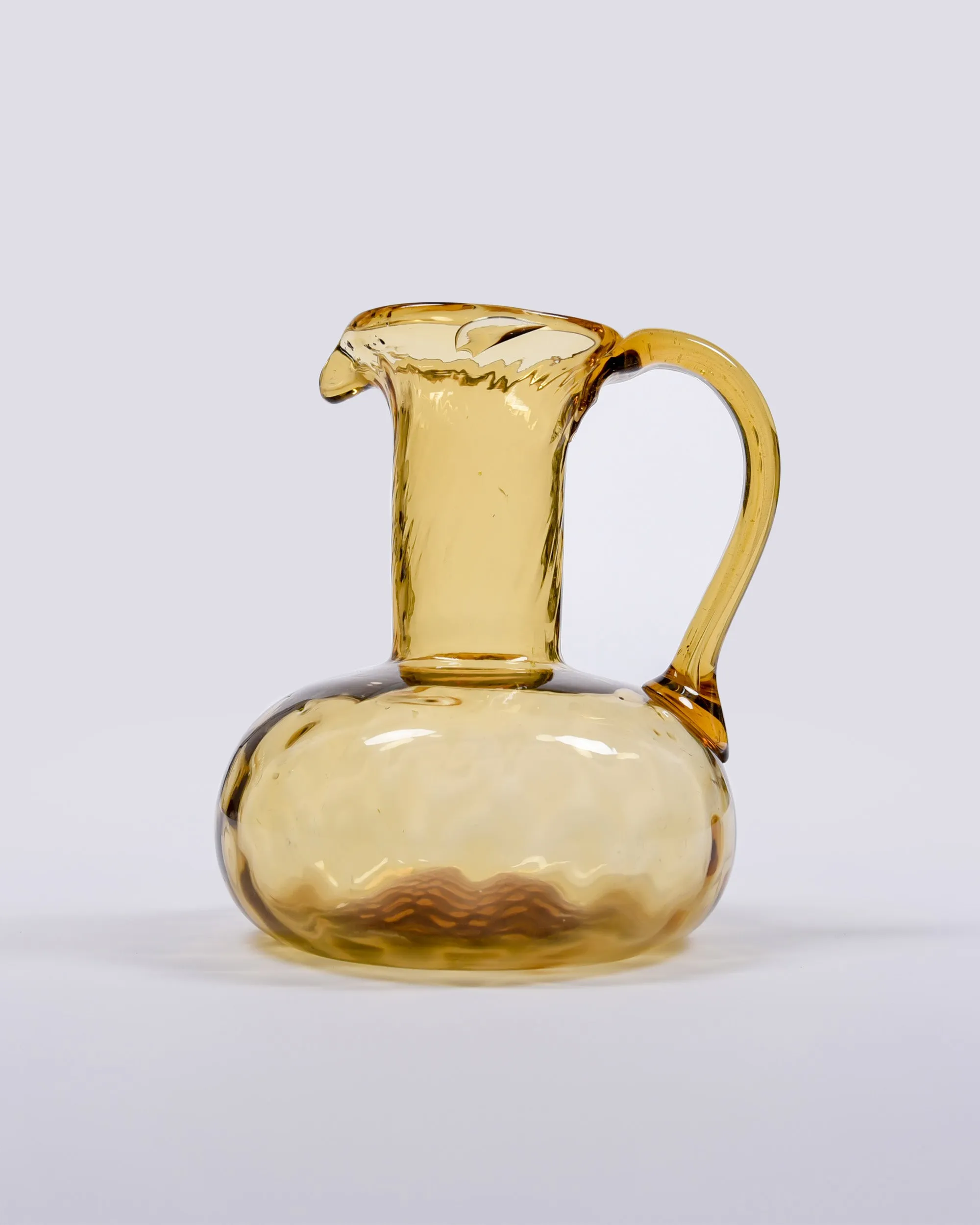 Amber blown glass pitcher