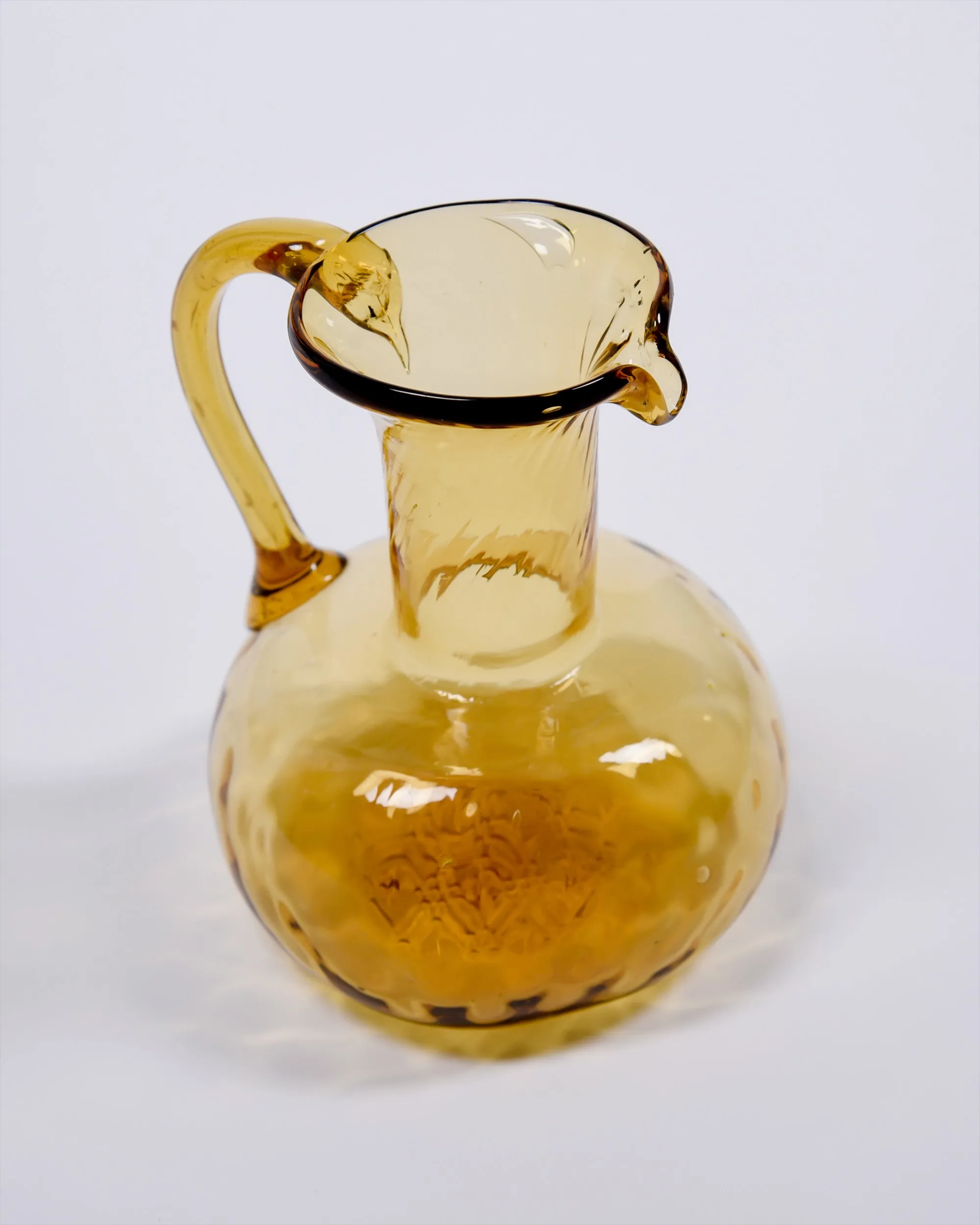 Amber blown glass pitcher