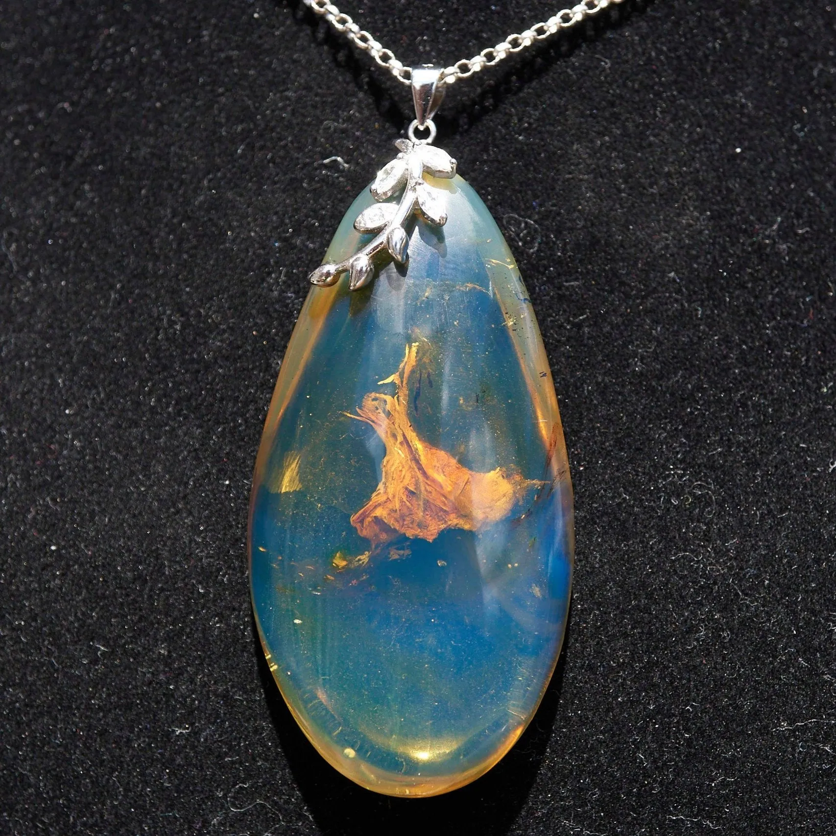 Blue Amber Cabochon Pendant – Genuine Vegetable Fossil in 925 Sterling Silver