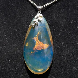Blue Amber Cabochon Pendant – Genuine Vegetable Fossil in 925 Sterling Silver