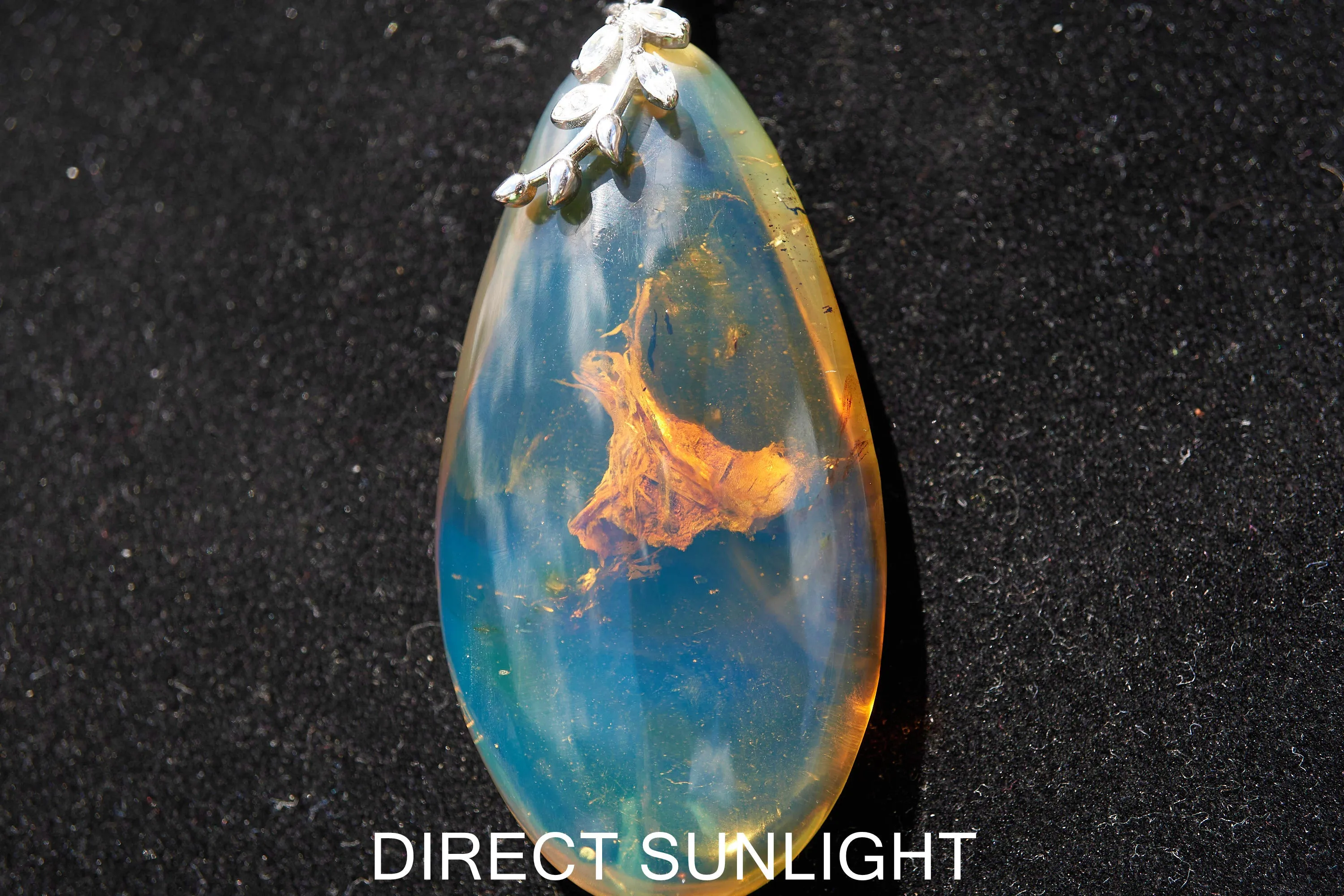 Blue Amber Cabochon Pendant – Genuine Vegetable Fossil in 925 Sterling Silver