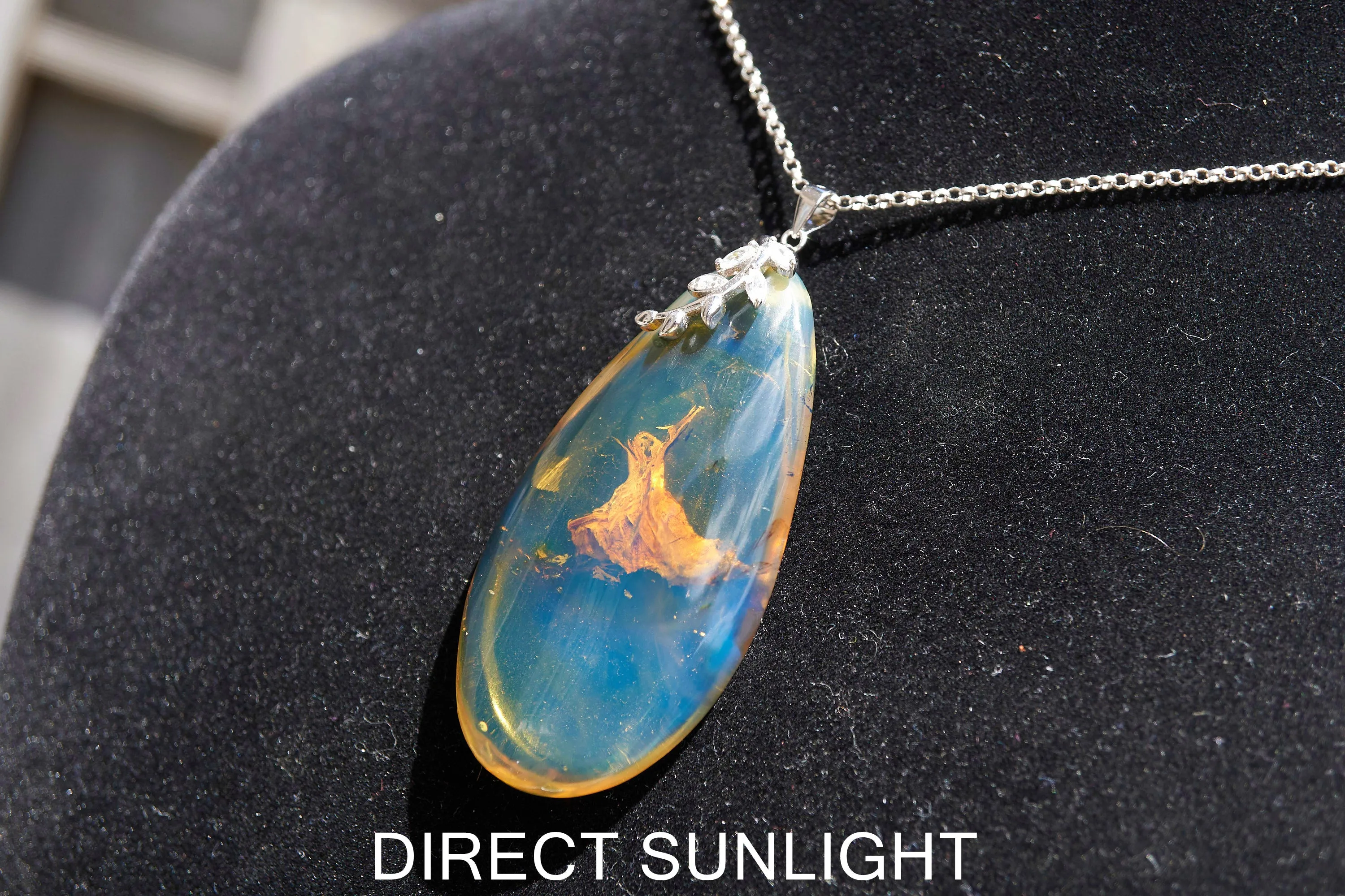 Blue Amber Cabochon Pendant – Genuine Vegetable Fossil in 925 Sterling Silver