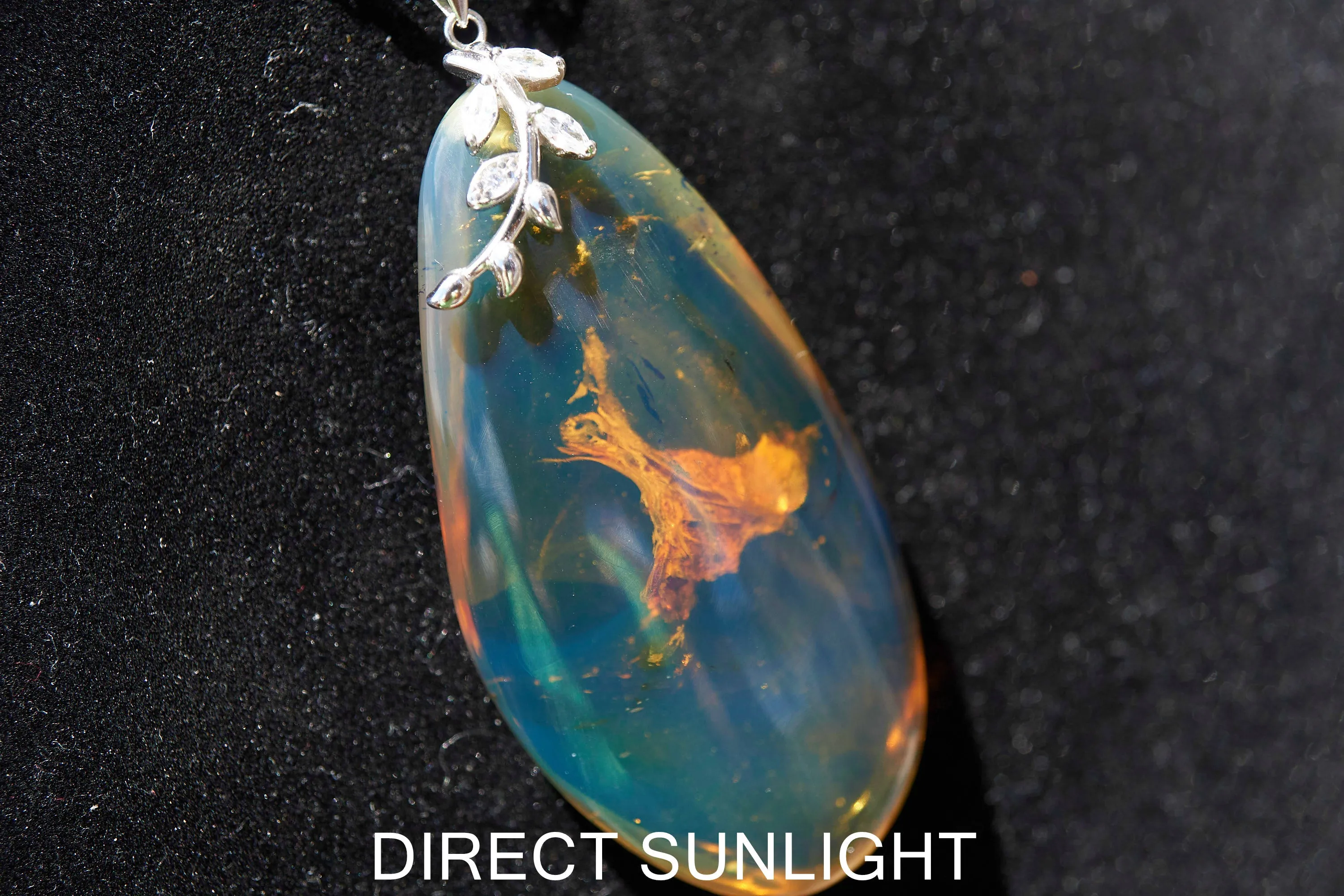 Blue Amber Cabochon Pendant – Genuine Vegetable Fossil in 925 Sterling Silver
