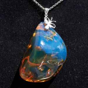 Blue Amber pendant Big Cabochon in Dominican Blue Amber