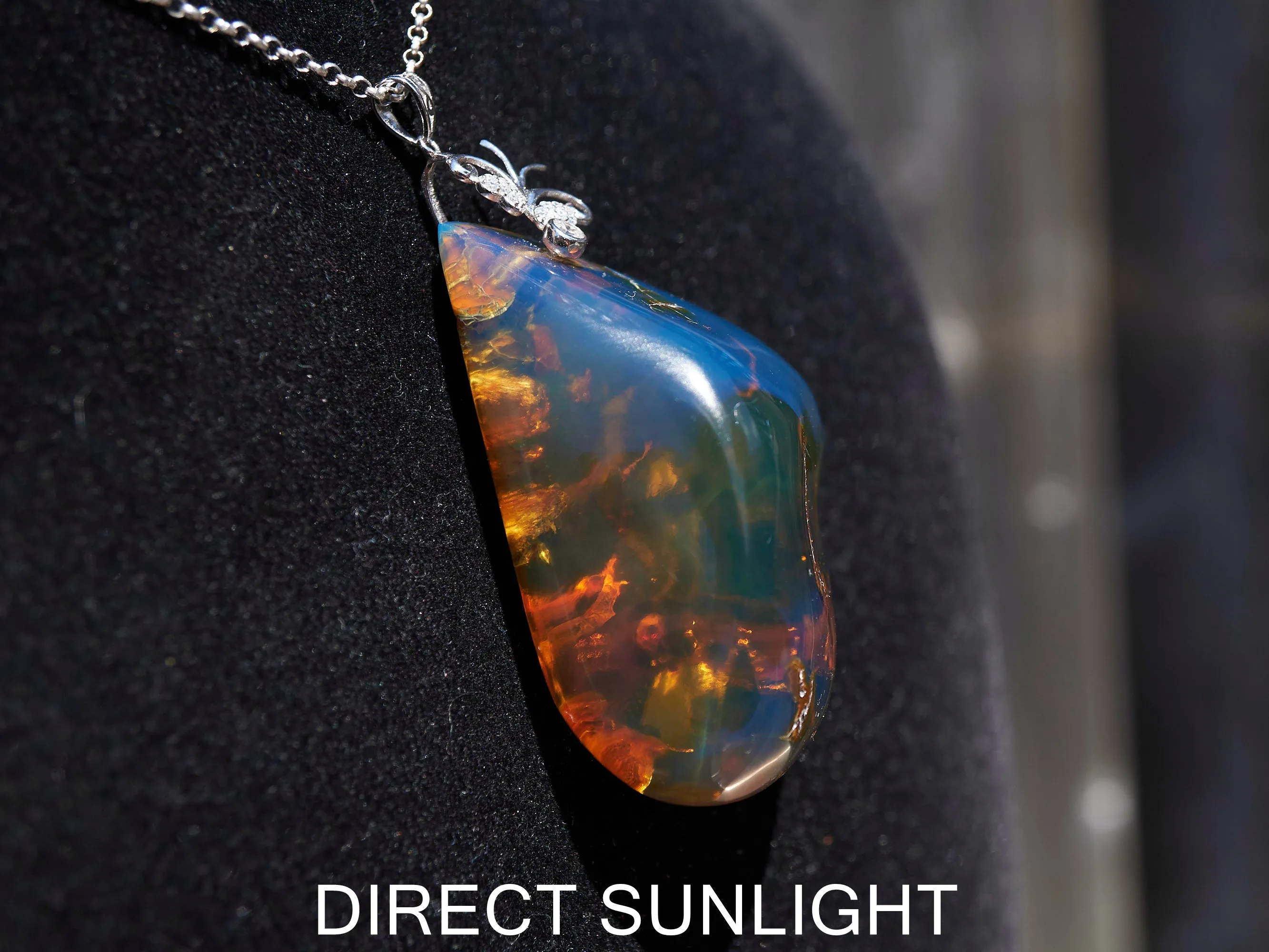 Blue Amber pendant Big Cabochon in Dominican Blue Amber