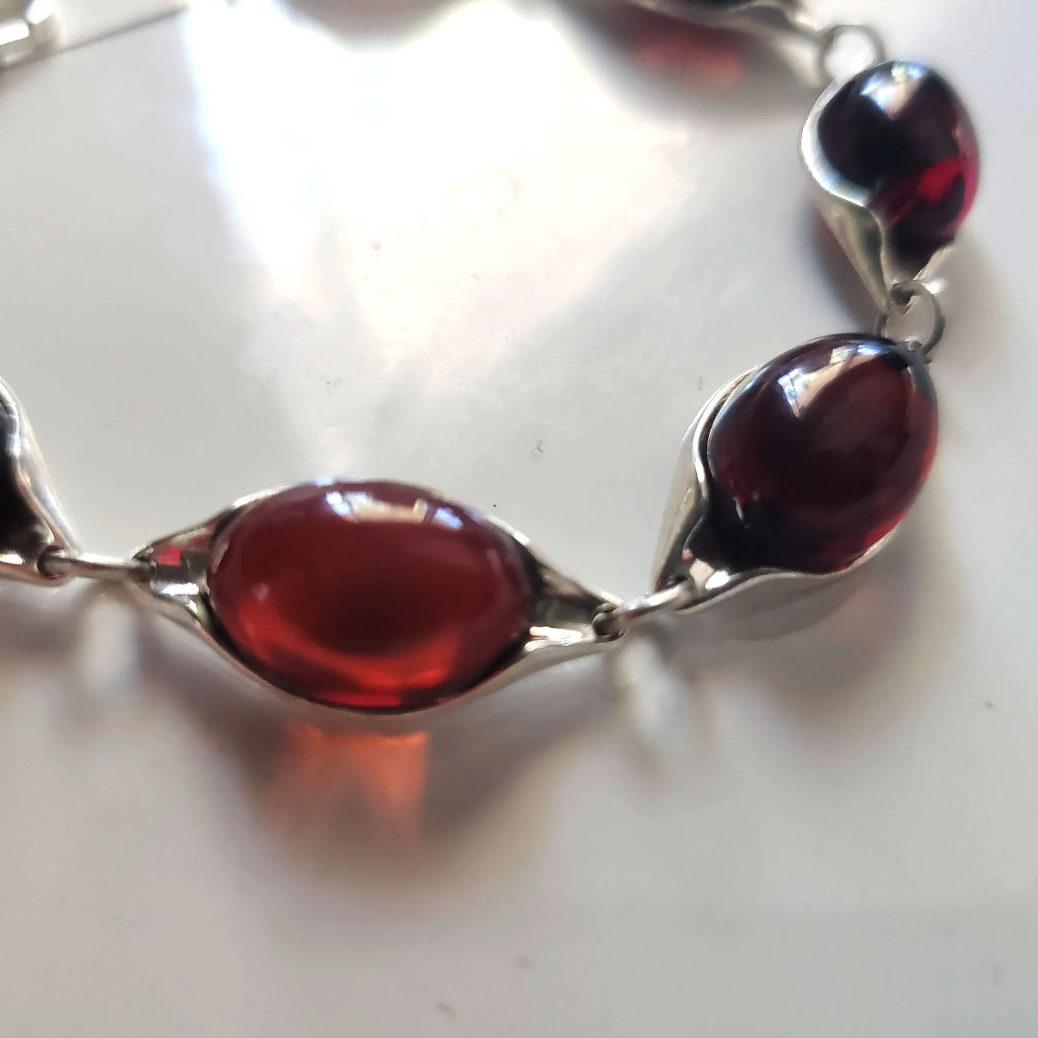 Cherry Red Oval Amber Bracelet Set in Sterling Silver