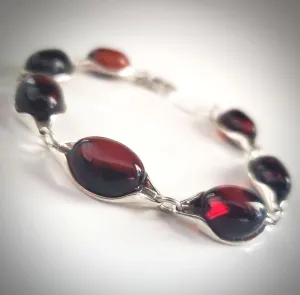 Cherry Red Oval Amber Bracelet Set in Sterling Silver