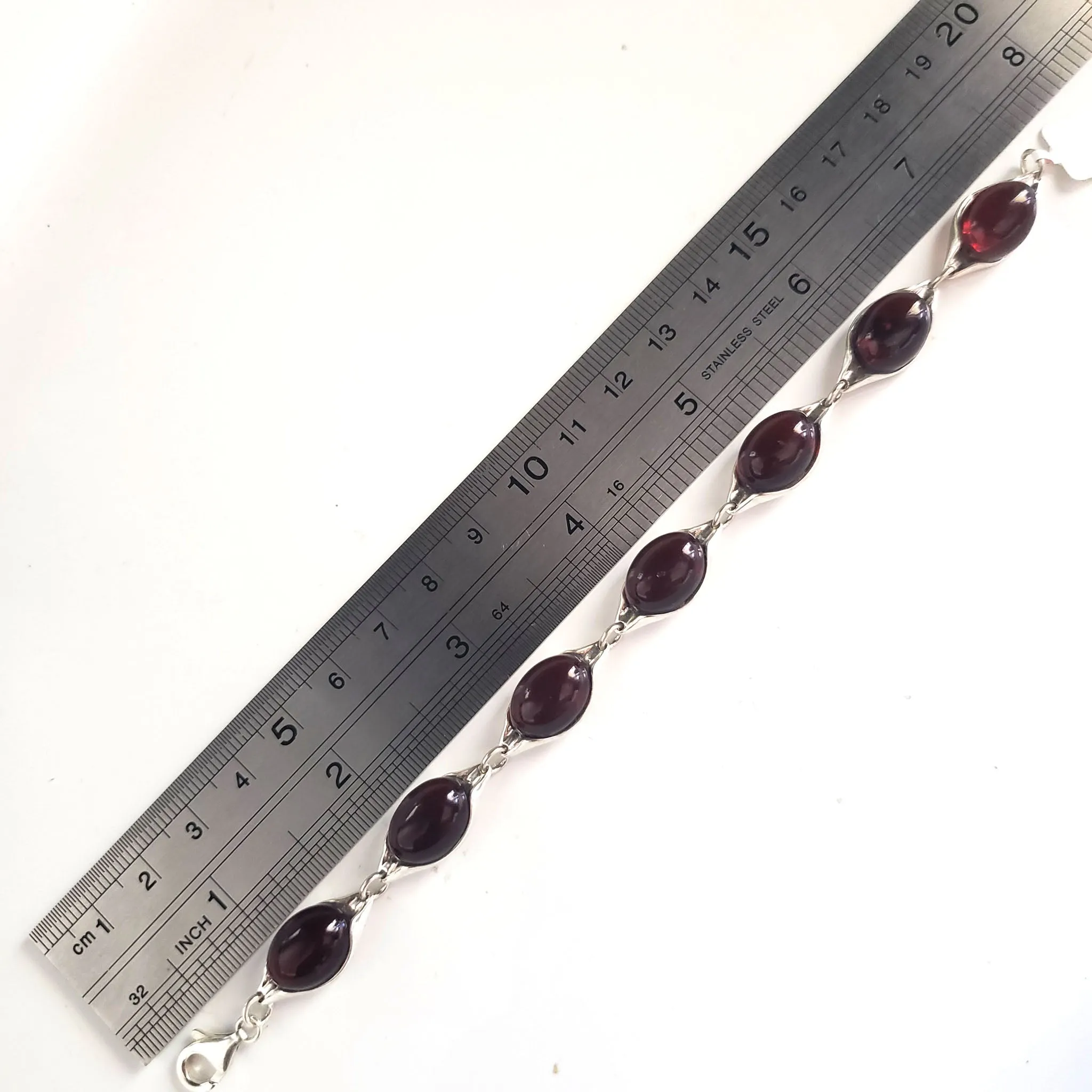 Cherry Red Oval Amber Bracelet Set in Sterling Silver
