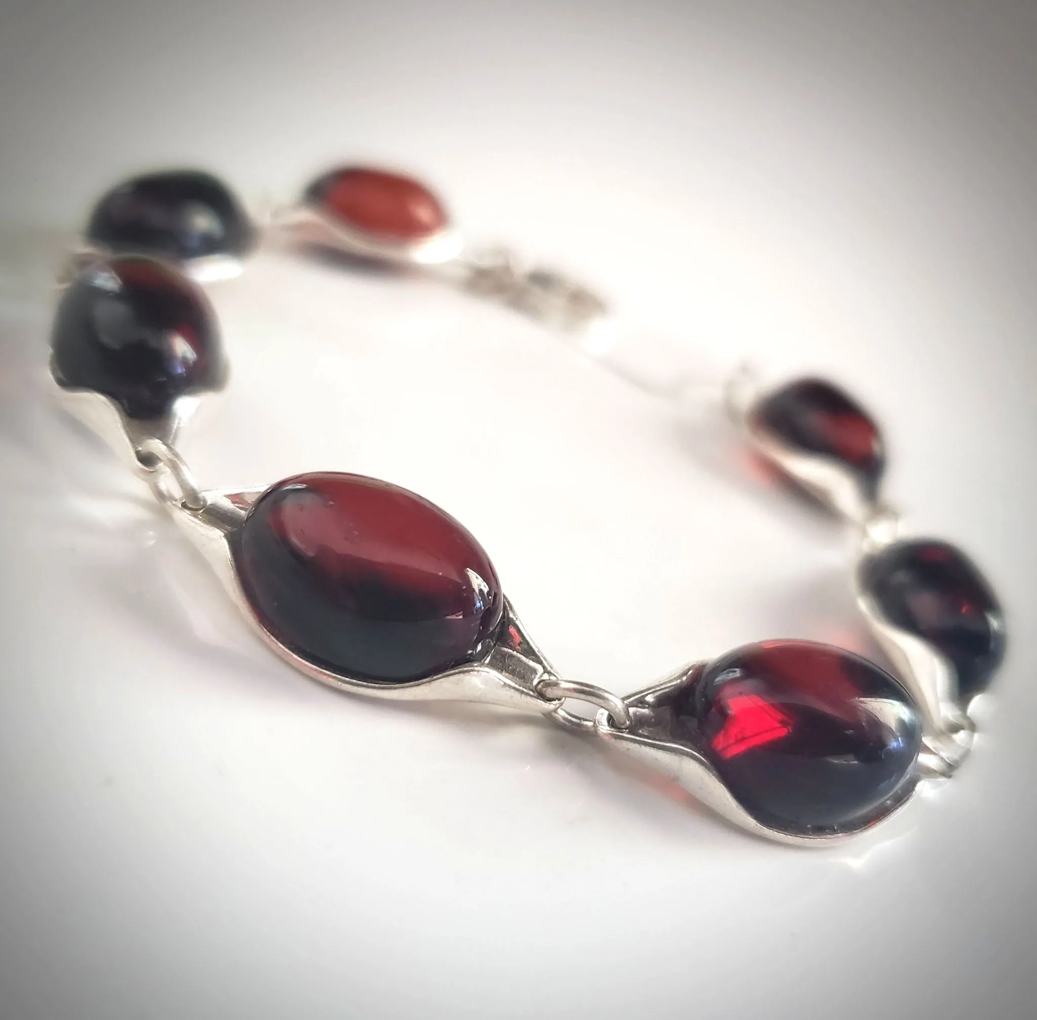 Cherry Red Oval Amber Bracelet Set in Sterling Silver