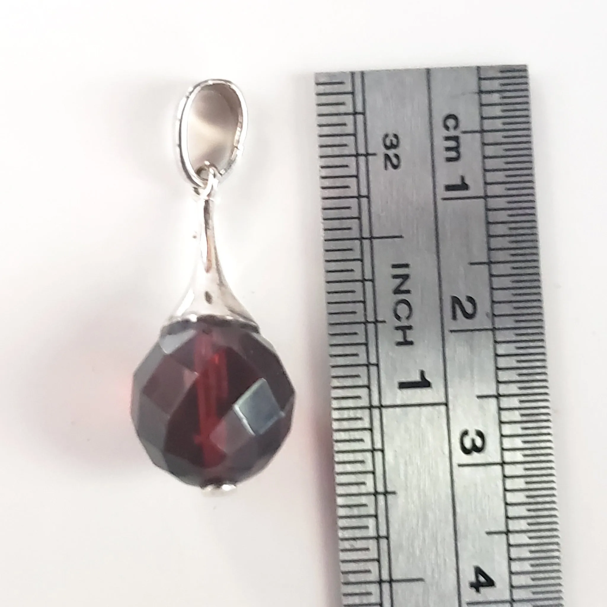 Diamond Cut Cherry Amber Sterling Silver Round Pendant