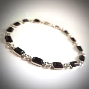 Elegant Cherry Red Amber Bracelet in Sterling Silver Setting