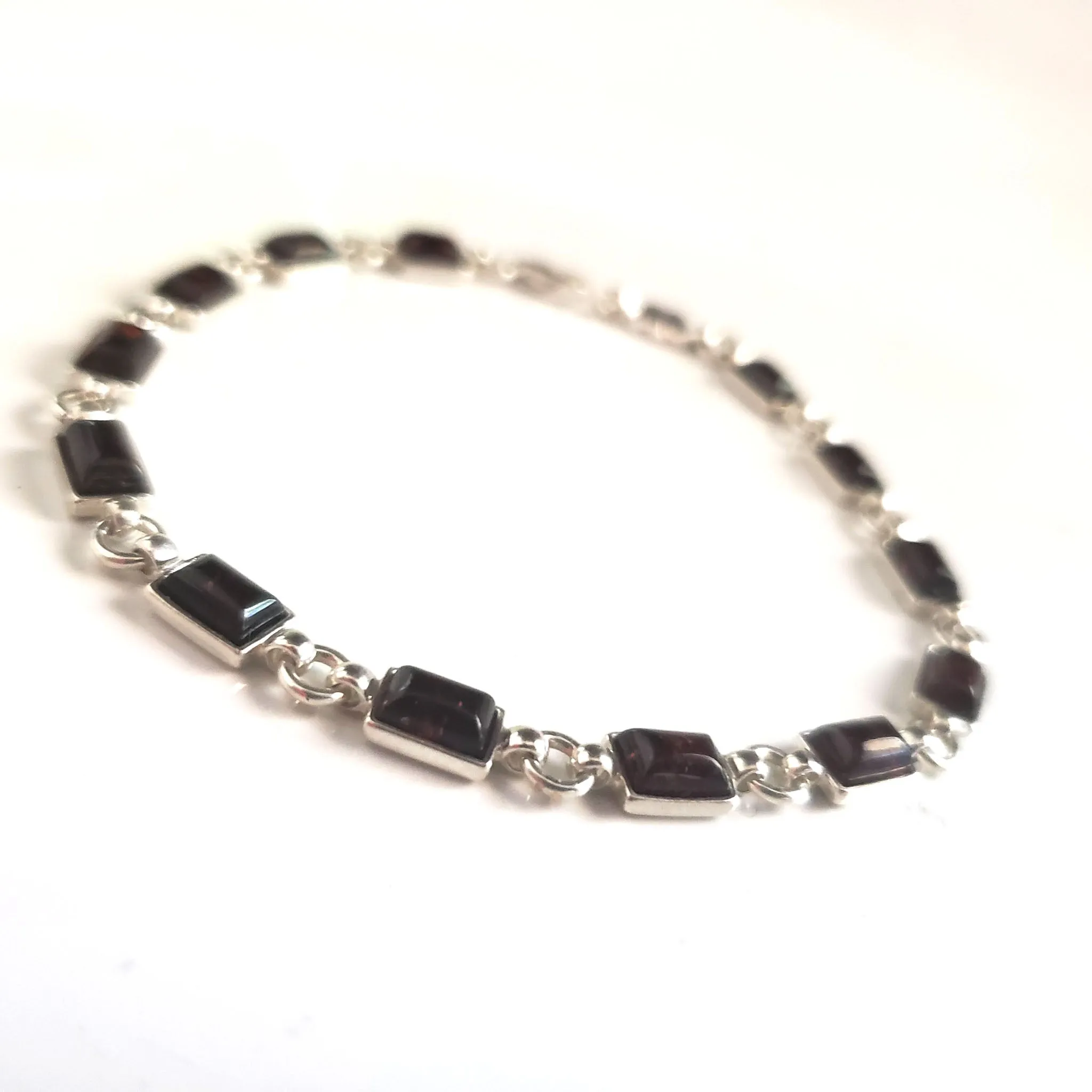 Elegant Cherry Red Amber Bracelet in Sterling Silver Setting