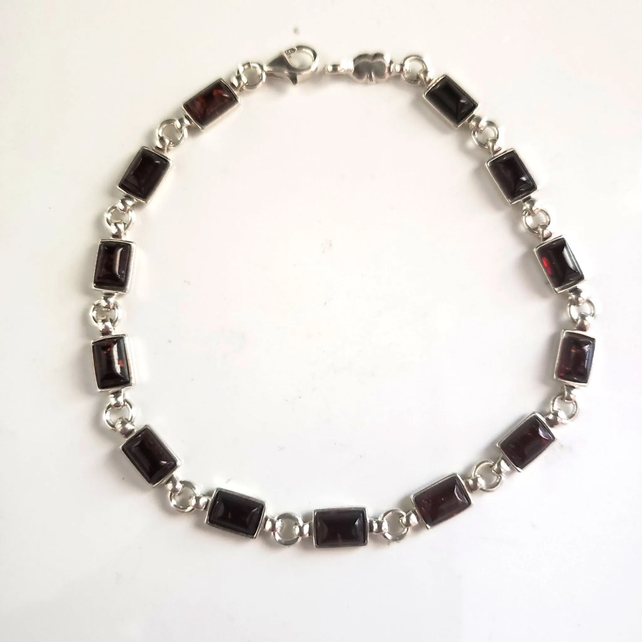 Elegant Cherry Red Amber Bracelet in Sterling Silver Setting