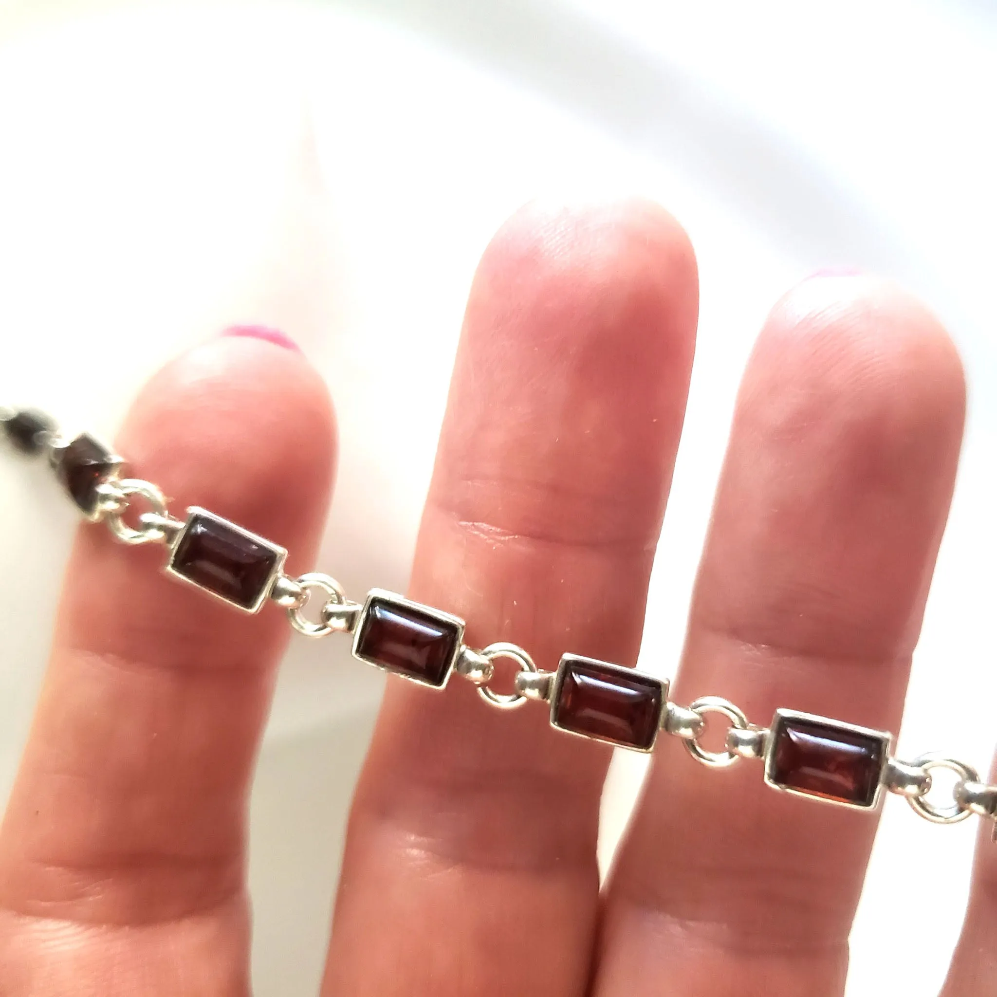 Elegant Cherry Red Amber Bracelet in Sterling Silver Setting
