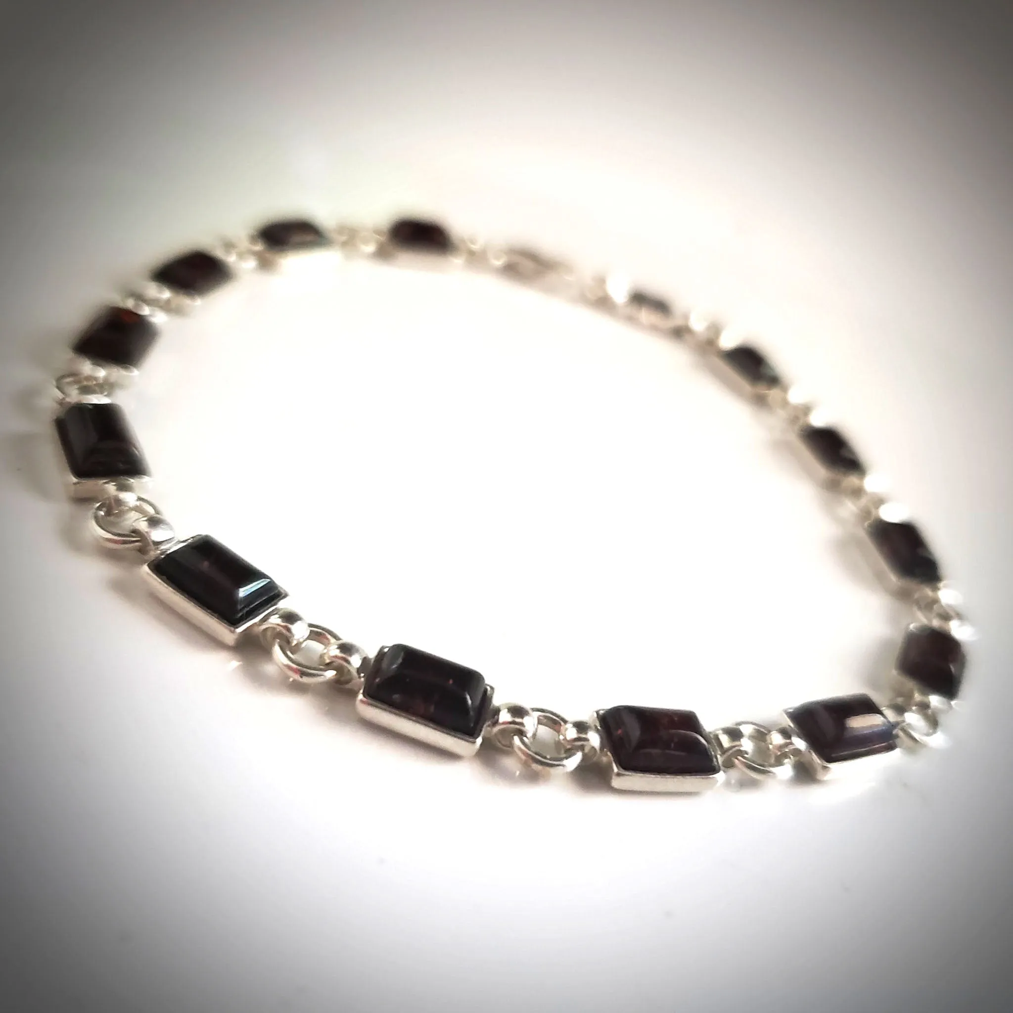 Elegant Cherry Red Amber Bracelet in Sterling Silver Setting