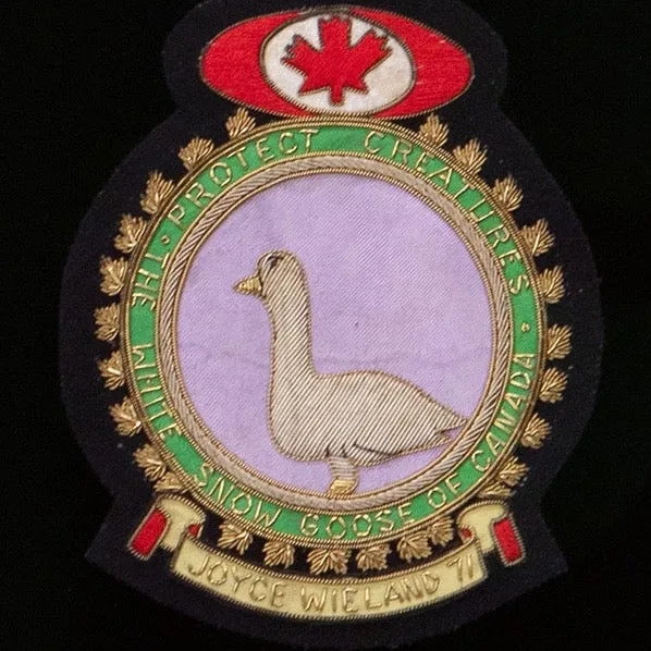 JOYCE WIELAND "WHITE SNOW GOOSE" EMBROIDERED CREST, 1971
