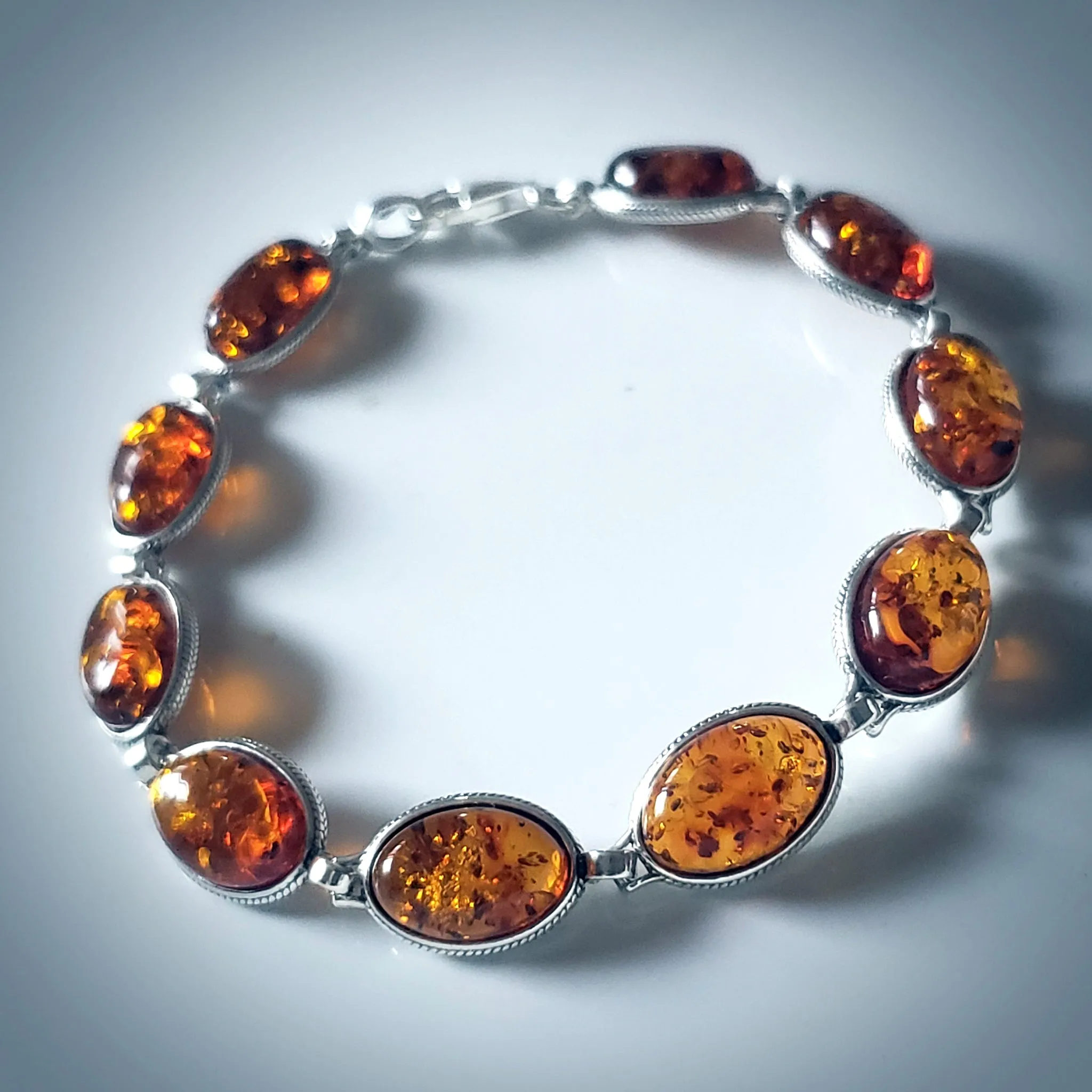 Oval Amber Beads in Sterling Silver Bracelet