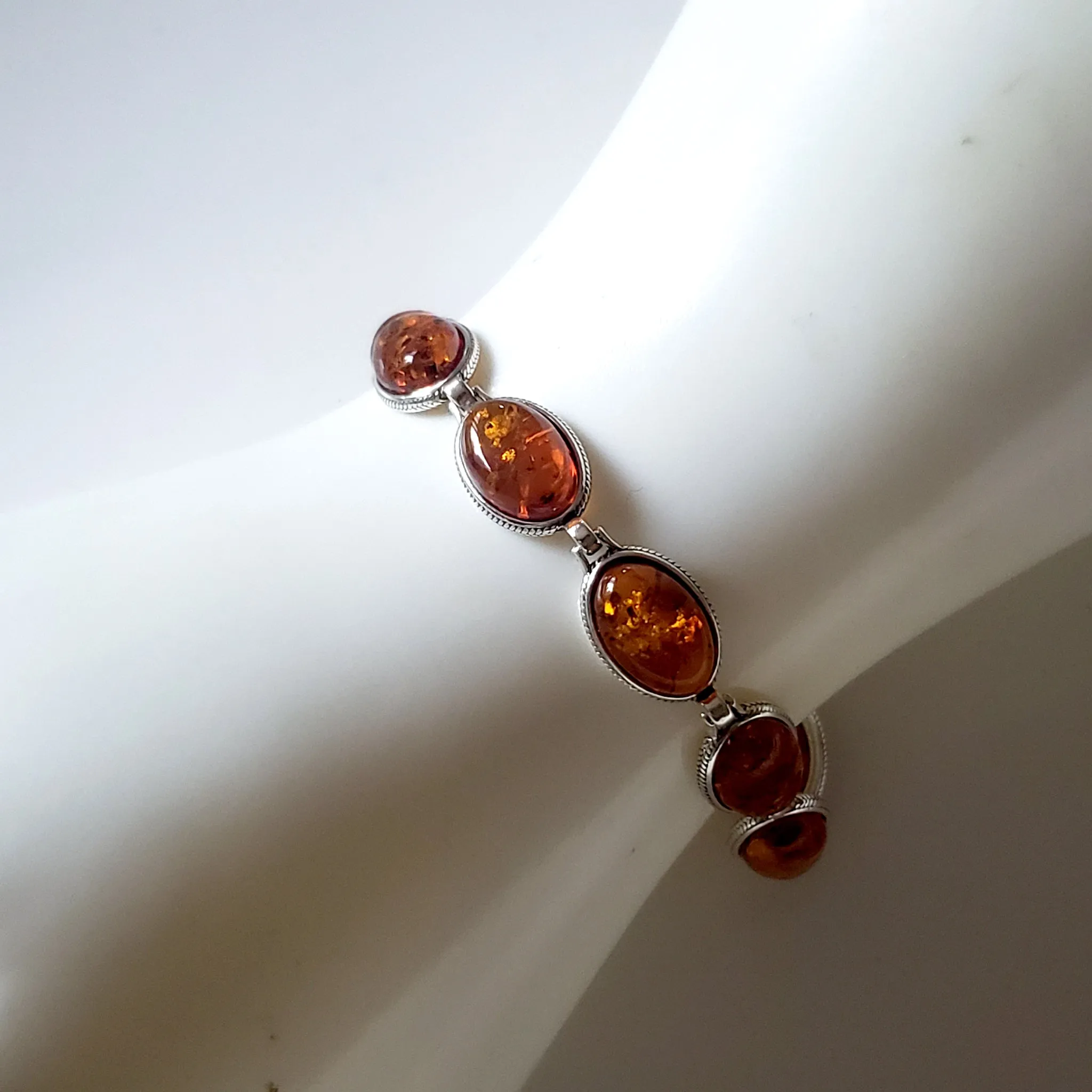 Oval Amber Beads in Sterling Silver Bracelet