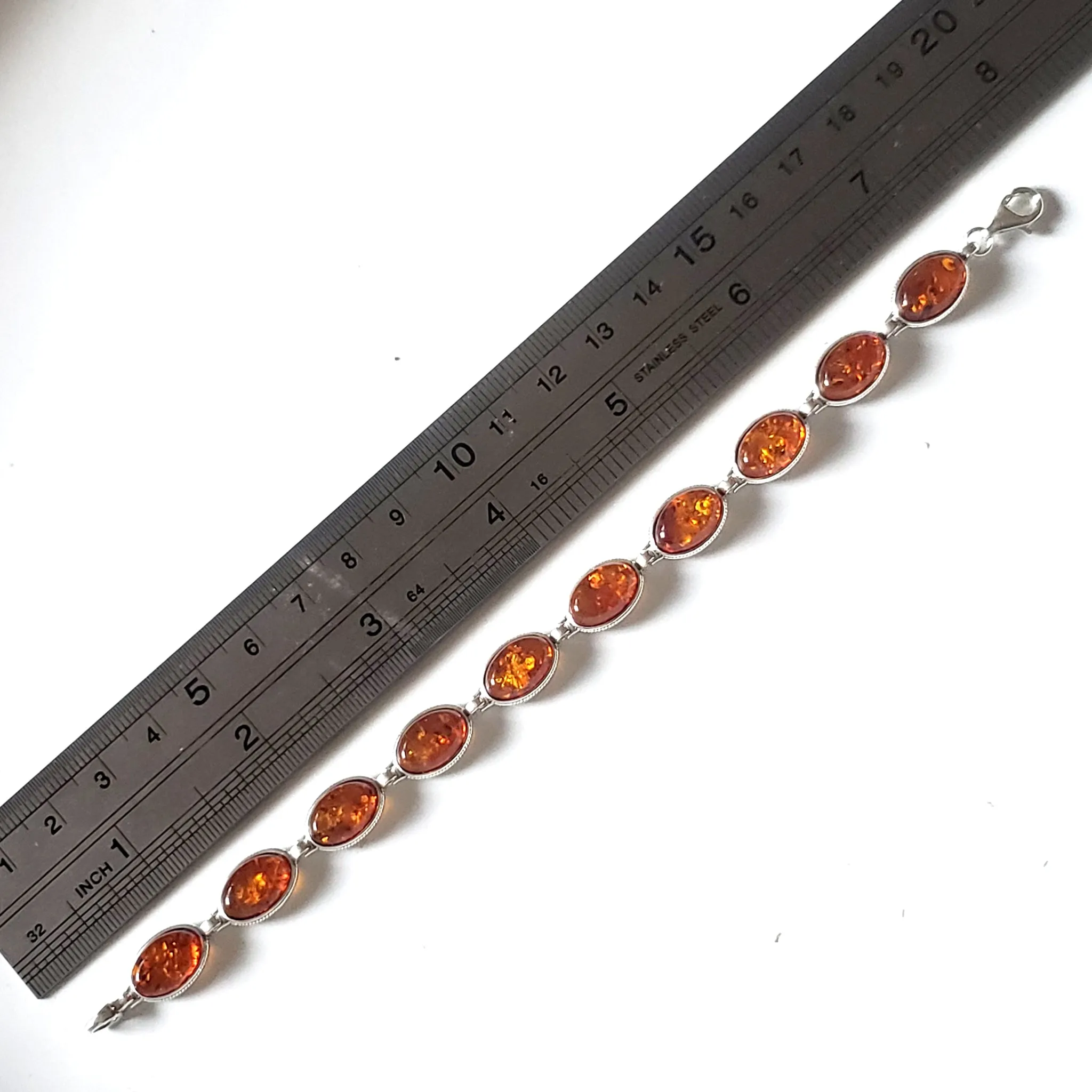 Oval Amber Beads in Sterling Silver Bracelet
