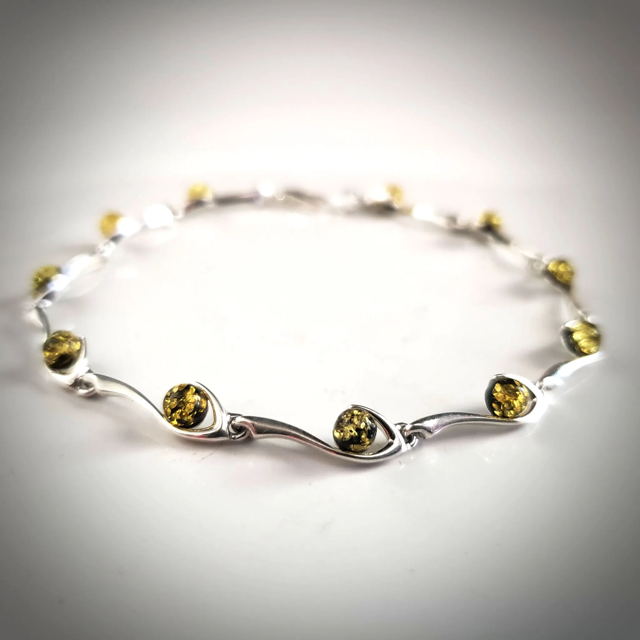 Silver Bracelet with Green Amber Round Beads