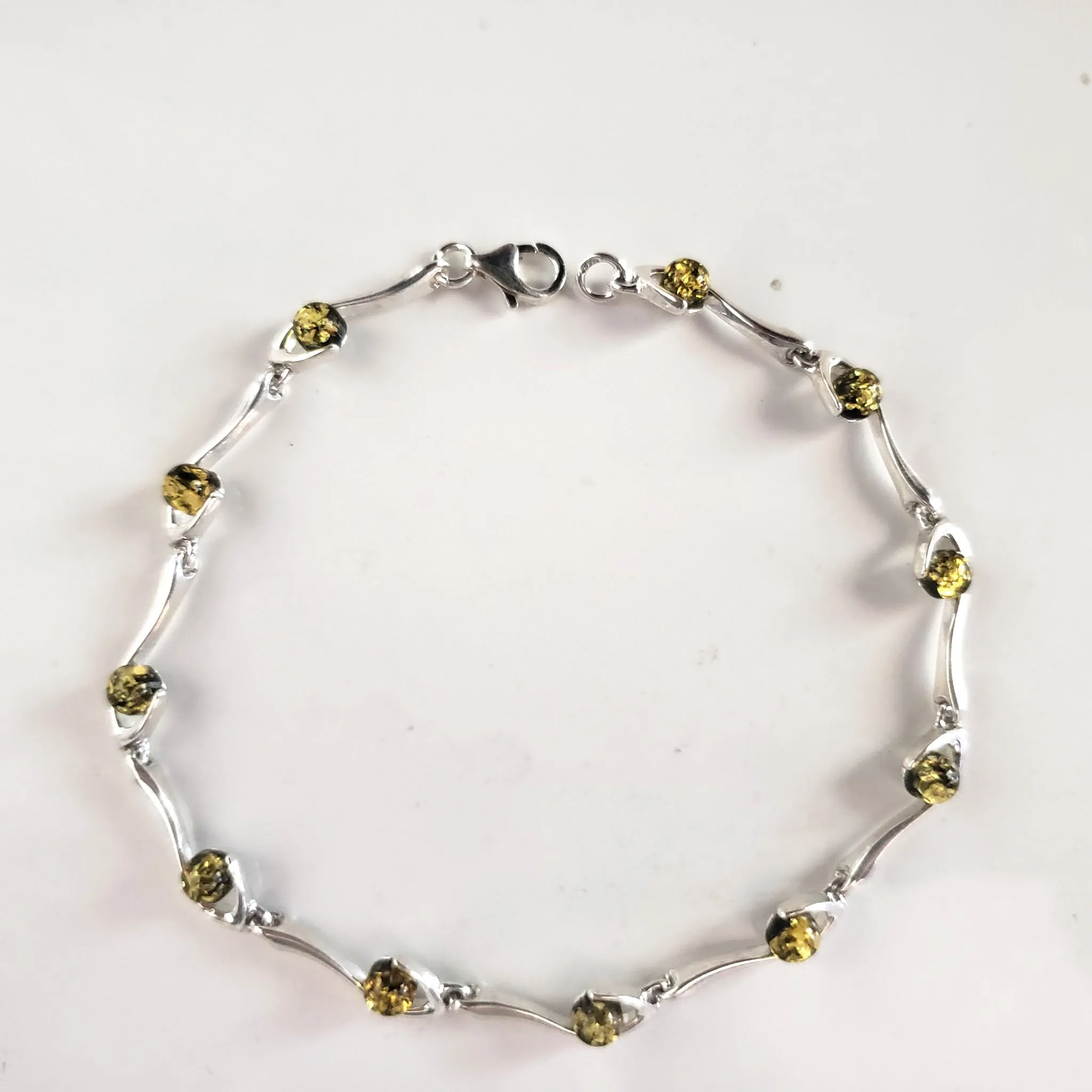 Silver Bracelet with Green Amber Round Beads